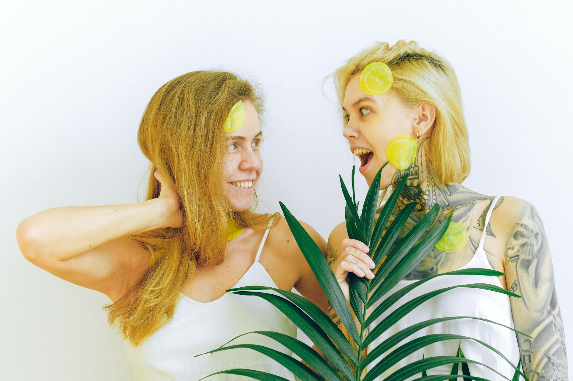 Woman holding silicone vibrator in contemplative pose, exploring changes in sensation